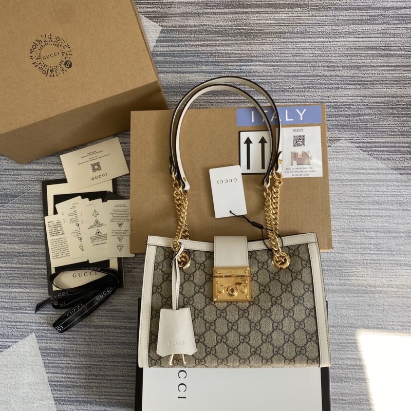G*u*i top handle bags